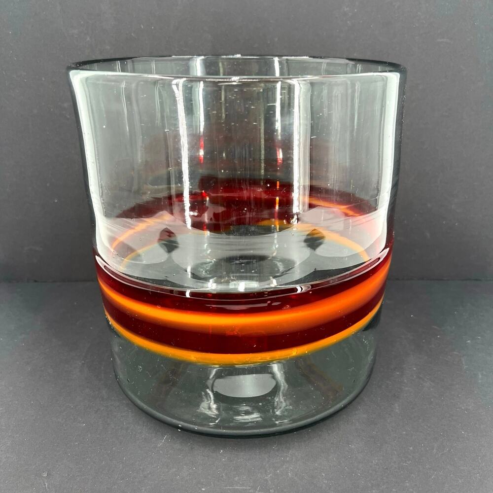 large vintage hand-blown glass cylinder bowl with red and orange striped bands.
